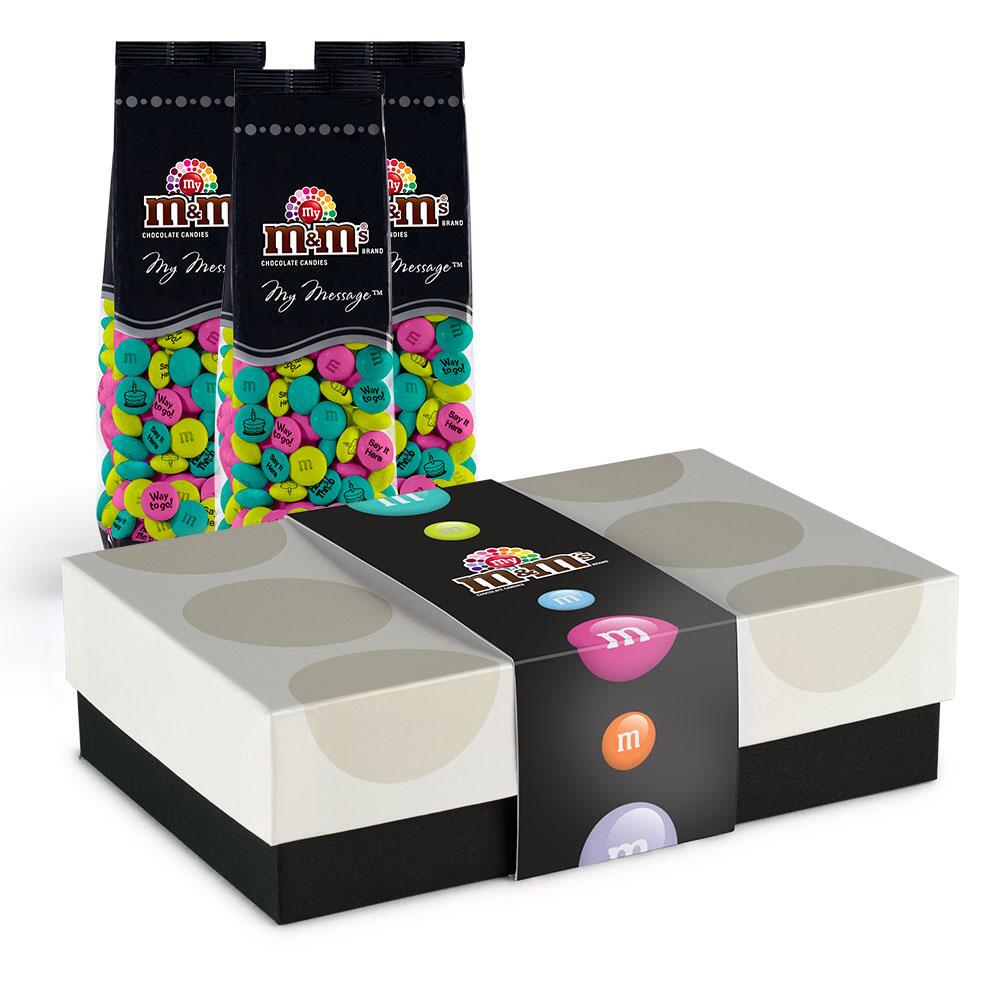 M&Ms has business gift options that will allow you to customize packages of M&Ms with your company colors, logo, or name. 