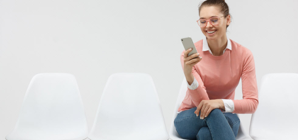 Woman reading text reminding