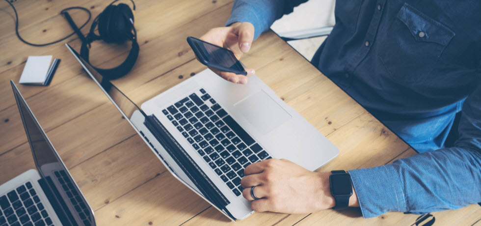 businessman using laptop PC and smartphone.